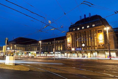 Street and tram tracks in front of the main station, tracers, blue hour, main station, Leipzig,