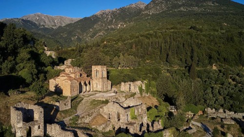 Drone shot, Church of Agia Sophia from the 14th century AD, Historic church and ruins with view of