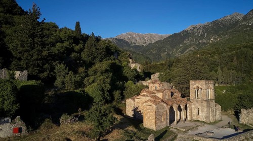 Drone shot, Church of Agia Sophia from the 14th century AD, Historic church and ruins surrounded by