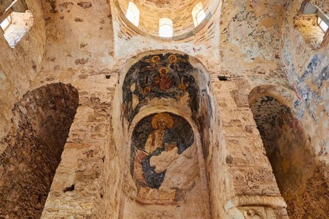 Church of Agia Sophia from the 14th century AD, interior view of a church with frescoes and flooded