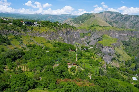 Sweeping view of gorge with scattered houses and lush greenery, Garni Gorge, Azat River, Kotayk