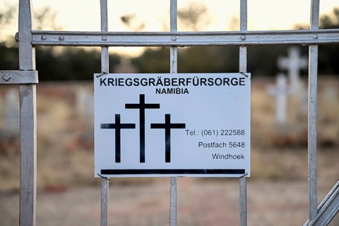 Namibia War Graves Commission sign at the entrance gate to the German military cemetery at