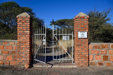 Entrance gate to the German military cemetery at Waterberg, Otjozondjupa region, Namibia