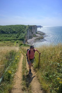 Hiking trail at Valleuse d'Etigue, hike from Etretat to Yport along the chalk cliff coast,