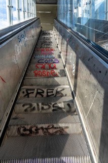 Escalator in a suburban railway station, full of graffiti, Day, Düsseldorf, North Rhine-Westphalia,