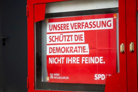 Poster of the SPD in Ludwigshafen with the text UNSERE VERFASSUNG SCHÜTZT DIE DEMOKRATIE. NOT YOUR