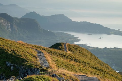Hikers on Rørsethornet stone staircase, with 3292 steps one of the longest continuous stone