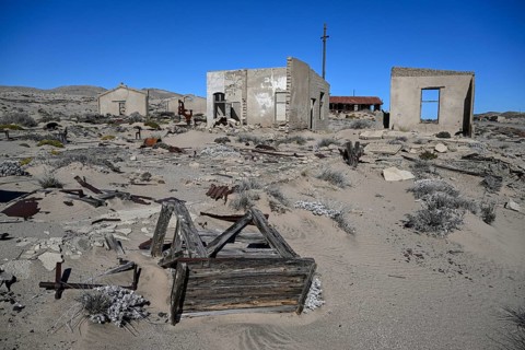 Ruined buildings in the desert sand, Pomona, restricted diamond area, near Lüderitz, Karas region,