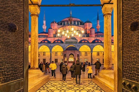 Inner courtyard of the Blue Mosque or Sultan Ahmed Mosque at dusk, Istanbul, Turkey