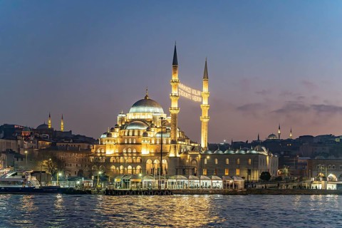 The New Mosque Yeni Cami at dusk, Eminönü, Istanbul, Turkey