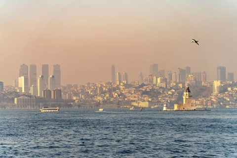 The Maiden Tower lighthouse, Leander Tower or Maiden Tower in front of the skyline of Istanbul,