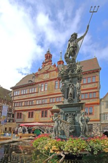 Neptune Fountain with sculpture of Neptune Roman god of the sea with trident, Renaissance Town