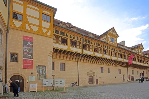 Inner courtyard of Hohentübingen Palace, half-timbered house with arcade, entrance, museum