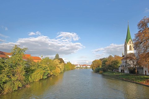 Collegiate church of St. Moriz built 14th century on the Neckar in autumn, Neckar riverbank,
