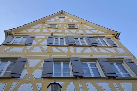 Yellow half-timbered house with shutters, gable, view upwards, Staig Rottenburg am Neckar, Neckar