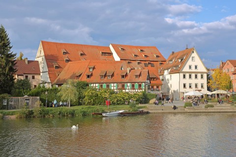 Half-timbered houses, town mill, tithe barn on the banks of the Neckar, pedestrians, boats,
