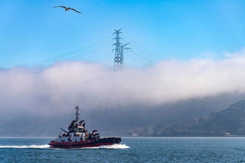 Coastguard boat on the Bosporus in the fog near Istanbul, Turkey