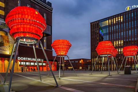 Illuminated sculptures of Dortmund roses in front of Dortmund's landmark U, Centre for Art and
