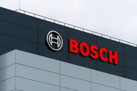 Modern, flat building with Bosch logo and cloudy sky in the background, Waiblingen,