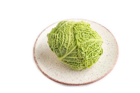 Green lettuce isolated on white background. Side view. healthy food, vegetable, minimalism
