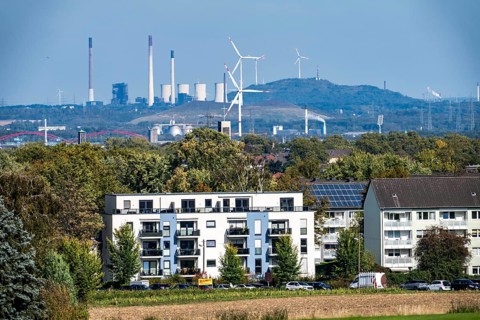 View over the western Ruhr area, from Essen-Haarzopf, housing estate with large photovoltaic