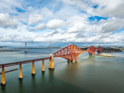 Forth Bridge from a drone, Queensferry Crossing, Forth Estuary, Scotland, United Kingdom