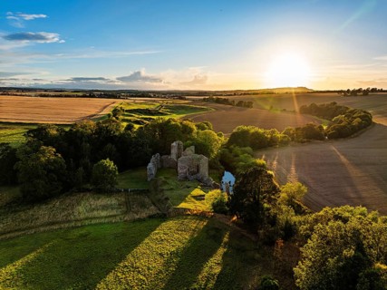 Ruins of Hailes Castle over River Tyne from a drone, East Linton, East Lothian, Scotland, UK