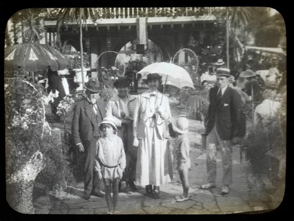 Family group standing in pleasure gardens at Karsino of Fred Karno, Tagg's Island, Molesley,