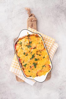 Madame Bovary's Georgian dish, chicken fillet with mushrooms, tomatoes and cheese, baked in a mold