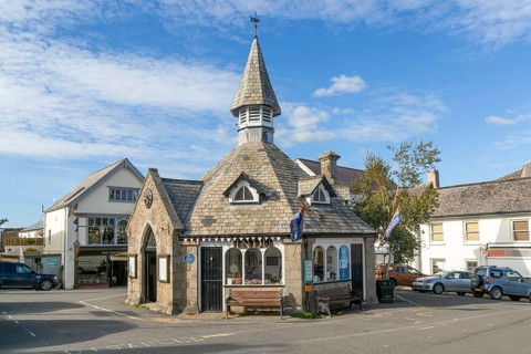 Historic octagonal market house building from 1862, village centre market place, Chagford, Devon,