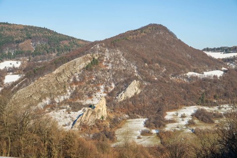 Cervenokamenské cliff (cervenokamenske bradlo), a huge rock at a mountain with bushes, trees and