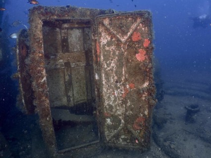 Rusted metal door of a wreck. Dive site wreck of the Vis, Pula, Croatia, Mediterranean Sea