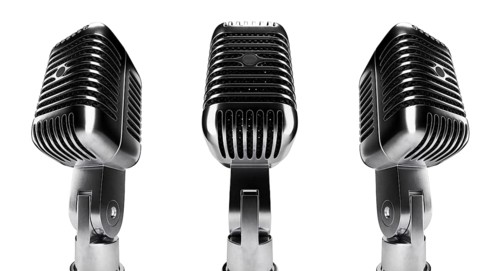 Classic vintage microphone set with black inside mesh isolated on a white background