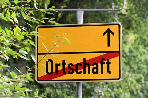 Instead of the usual place name sign, a replacement place name sign has been installed in the