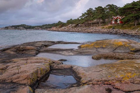 Falun red or Swedish red boathouses, Bohus granite, Resö island, Bohuslän, Skagerrak, Sotenäs,