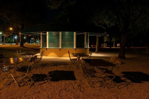 Night shot of a closed kiosk with seating in the Herrenhausen Gardens, Herrenhausen, Hanover, Lower