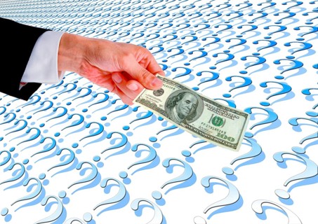 Symbolic image, hand reaches out 100-dollar note, dollar continues to be leading currency or