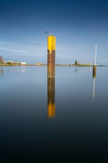 View of a steel dolphin standing in the Weser, long exposure, Bremen, Germany