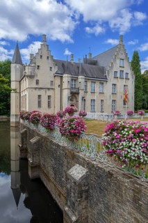 Kasteel Cortewalle, 15th century moated castle in Flemish Renaissance style at Beveren in summer,
