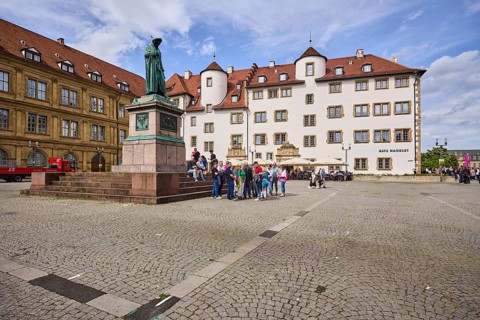 Schiller monument, Prinzenbau, restaurant Alte Kanzlei, outdoor area of a restaurant with parasol,