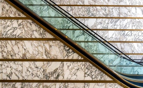 Escalator in the foyer of the Meoclinic, private practices in Friedrichstraße, Berlin, Germany