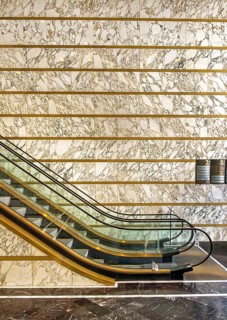 Escalator in the foyer of the Meoclinic, private practices in Friedrichstraße, Berlin, Germany