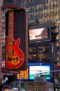 Illuminated advertising for the Hard Rock Café in Manhattan, New York City, USA