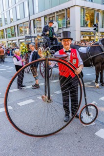 A penny-farthing rider with top hat, Oktoberfest, Munich, Upper Bavaria, Bavaria, Germany