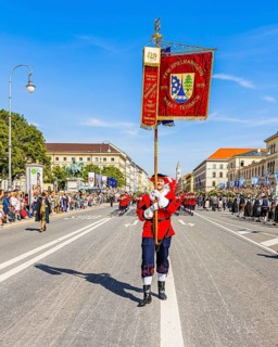 Flag bearer of the marching band of the Teisnach volunteer fire brigade in Lower Bavaria,