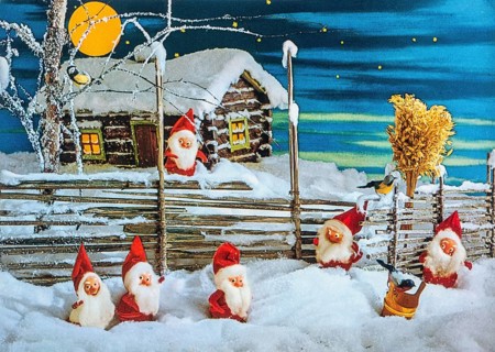 Old Christmas greeting card. Elves in snow in front of a fenced yard and log cabin