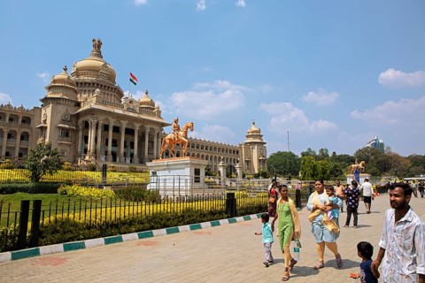Indian families at the Vidhana Souda or Government Palace of Karnataka, Begaluru or Bangalore,