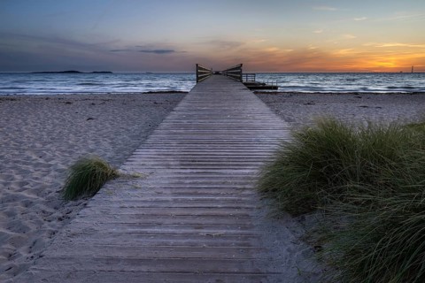 Spacious, empty beach with a pier, evening lighting, gentle sound of the sea, pier, Kobaek Strand,