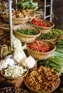 Market stall selling vegetables inside new market building, Johor Bahru, Jahor, Malaya, Malaysia,