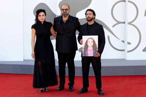 Venice, Italy - 3 September 2025: Clara Khoury, Amer Hlehel, Motaz Malhees with a portrait of